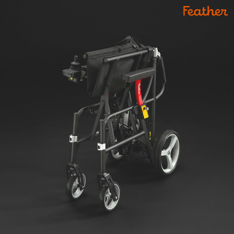 Feather power wheelchair folded upright