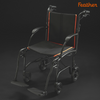 Feather transport wheelchair, black with orange trim, on a dark background