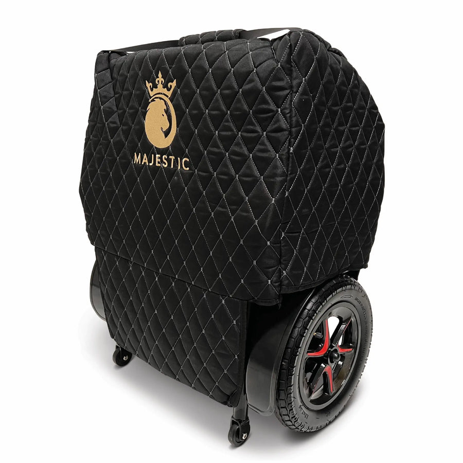 Quilted black ComfyGO travel bag covering a folded power wheelchair