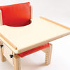 Smirthwaite wooden tray on a Heathfield chair