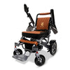 ComfyGO Majestic IQ-7000 folding power wheelchair with tan upholstery