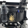 Armrest bag on a wheelchair holding a water bottle and small items