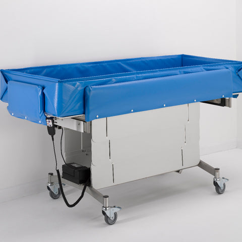 Smirthwaite Mobi-Shower trolley with blue padded sides and height-adjustable frame