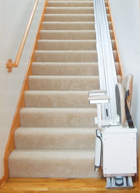 Harmar SL350 straight stairlift parked at the bottom of a carpeted stair