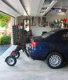 Bruno Chariot following a blue car out of a garage
