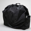 Black nylon wheelchair carry bag, zipped closed, with a top handle and a shoulder strap
