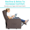 Woman reading in a brown Vive large lift chair reclined with the footrest up