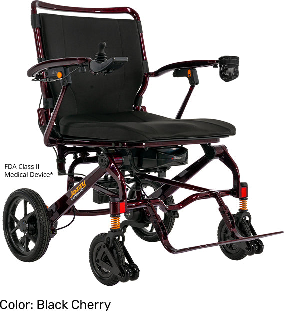 Pride Jazzy Carbon HD folding power wheelchair with a dark red frame