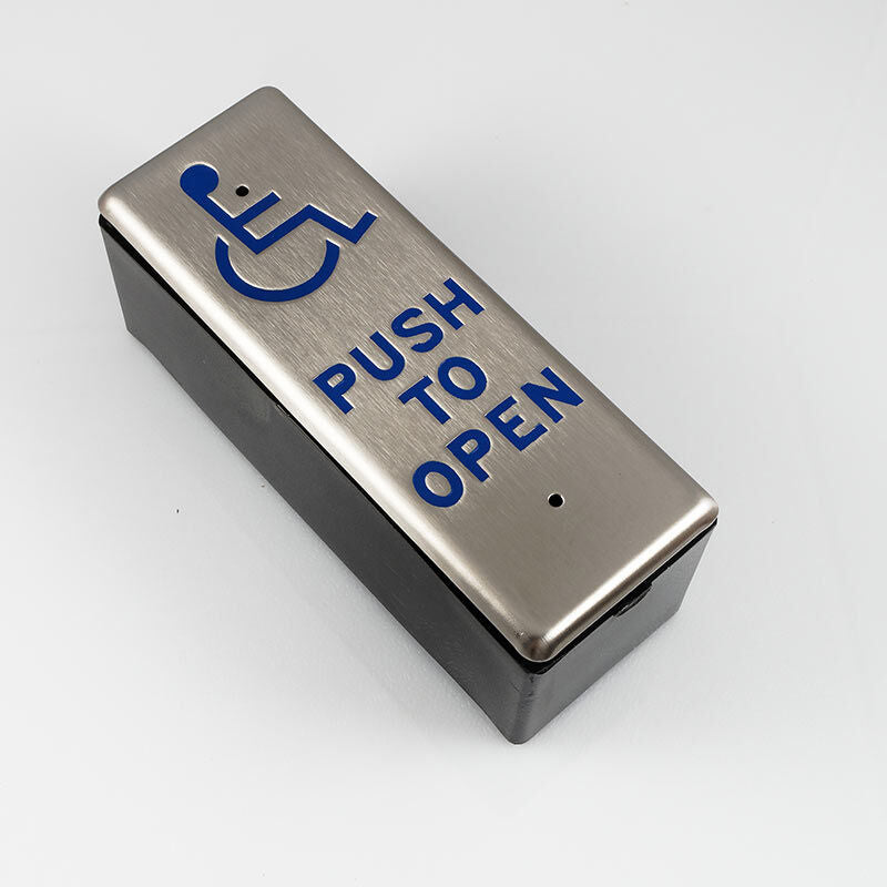 Open Sesame narrow stainless steel wall push pad with the wheelchair symbol